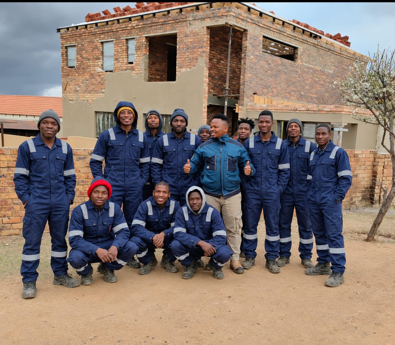 MwelaSons Group team on a building site
