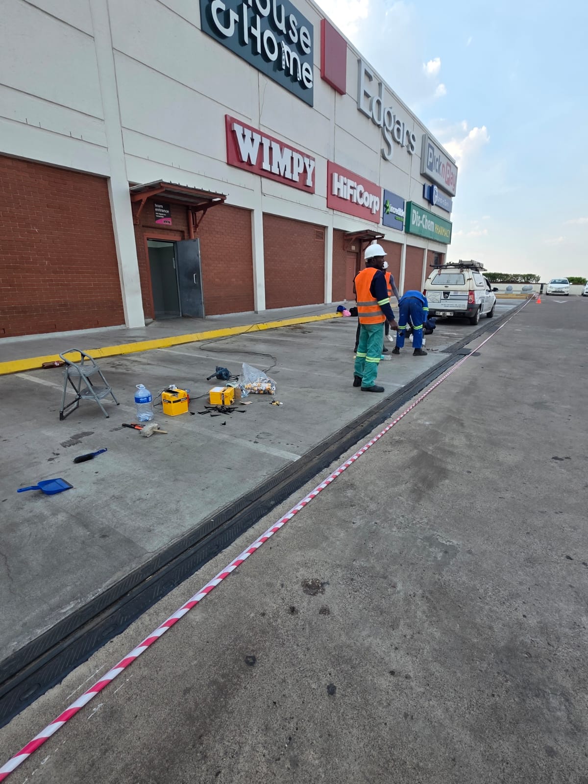 Team installing an expansion joint at a shopping centre