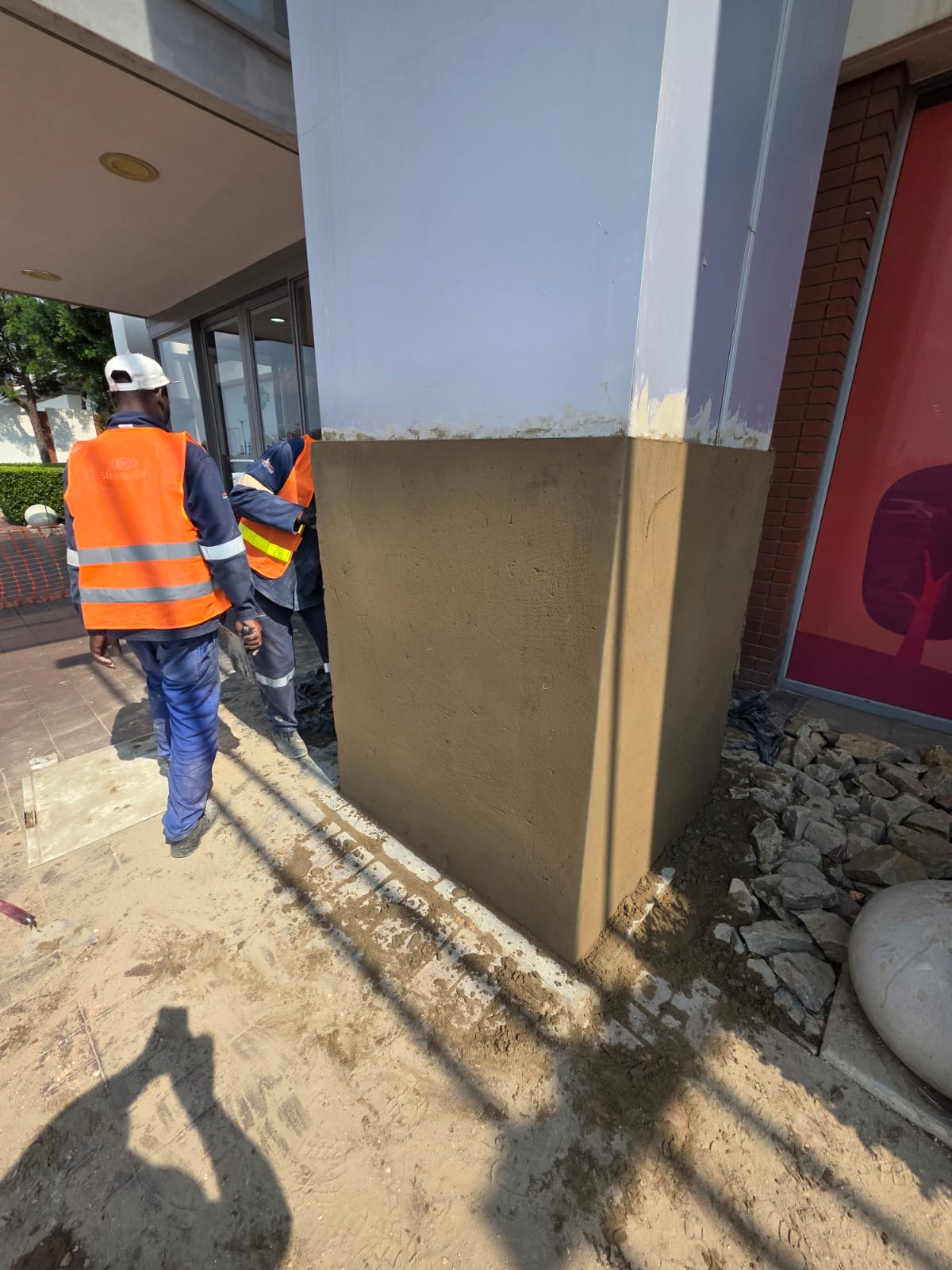 Plastering repair on a commercial building column
